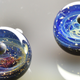 Illustration for article titled Become Master of Your Own Little Cosmos With a Space Glass Pendant